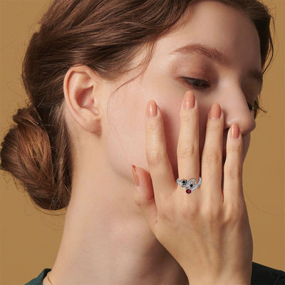 Adjustable Ring with Black Paw Prints & Red Gemstone
