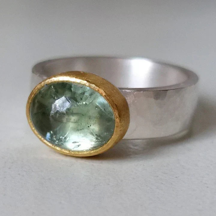 Green ring with rounded stone, vintage